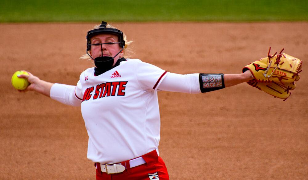 Redshirt sophomore pitcher Sydney Nester winds up against Virginia Tech on Sunday, March 14, 2021 at Dail Softball Stadium. Nester pitched 2.1 innings, giving up five earned runs on six hits and striking out one. The Wolfpack lost 17-4 after five innings.