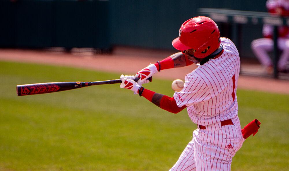 Junior outfielder Terrell Tatum swings against Louisville on Saturday, March 20, 2021 at Doak Field. Tatum went 2-4 with a home run as the Wolfpack lost 6-3.