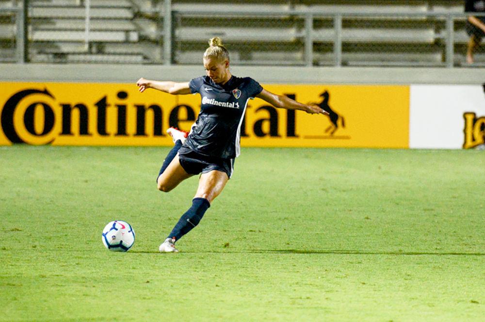 NC Courage defender Merritt Mathias sends the ball downfield during the club's match against Reign FC at WakeMed Soccer Park on Saturday, July 13, 2019. The Courage topped the Reign, 2-0.