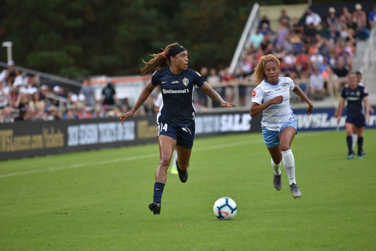 Jessica McDonald beats her defender and looks for an open pass on Sunday, Oct. 27. McDonald scored the second of four goals during the Courage&#8217;s 4-0 win.