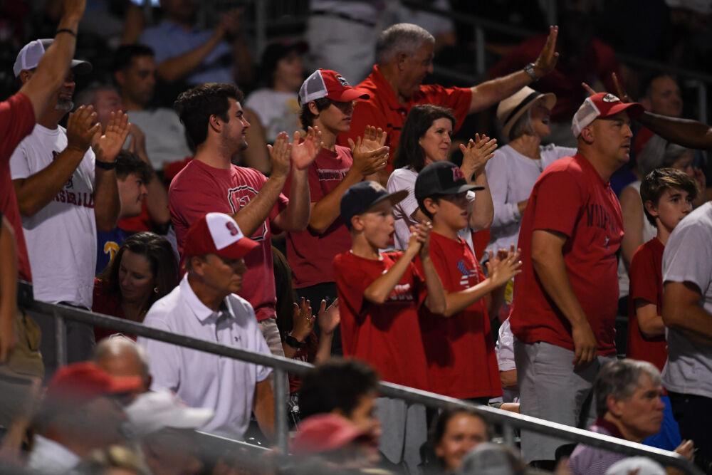 NC State fans cheer on the Wolfpack at Truist Field in Charlotte during the ACC Championship game against Pitt on Thursday, May 27, 2021.&#160;The Wolfpack beat the Panthers 3-2.