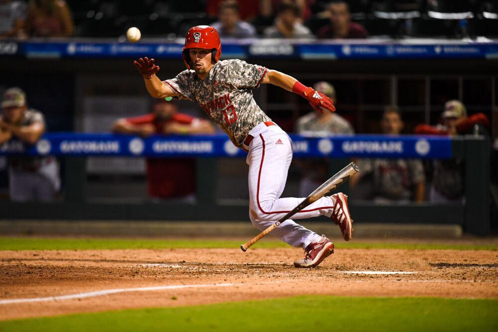Sophomore infielder Tyler McDonough runs to second base after batting during the game versus Pitt on Thursday, May 27, 2021 at Truist Field during the ACC Championship.&#160;The Wolfpack beat the Panthers 3-2.