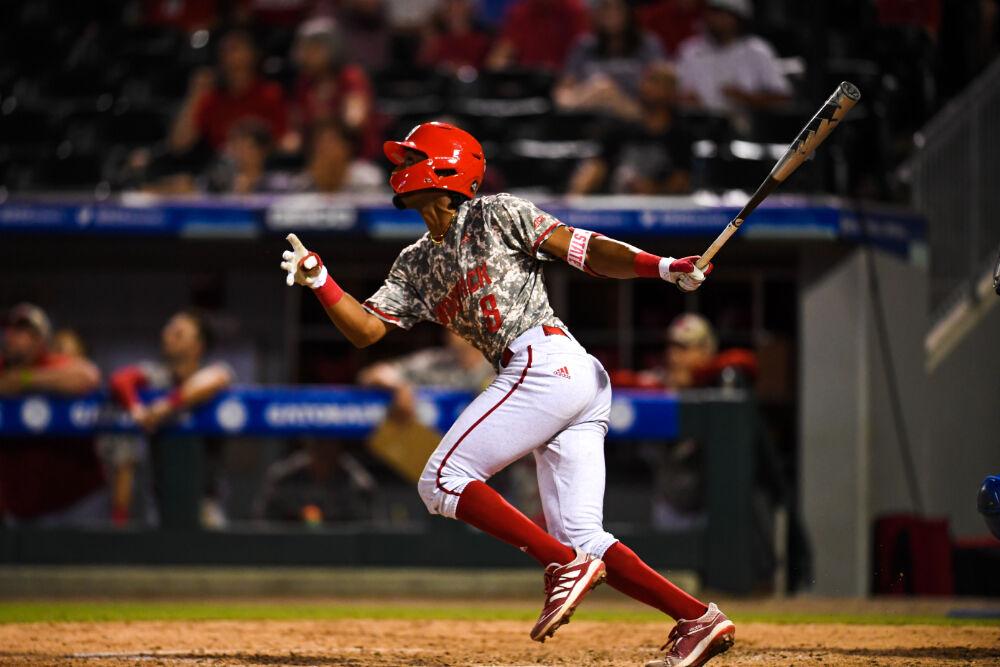 Freshman infielder Jose Torres begins to run to second base after batting during the game versus Pitt on Thursday, May 27, 2021, at Truist Field during the ACC Championship.&#160;The Wolfpack beat the Panthers 3-2.