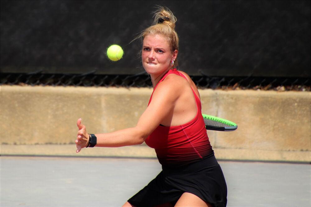 5th year Anna Rogers looks to hit ball at J.W. Isenhour Tennis Center on Friday, April 9th, 2021. Rogers won her match adding to NCSU Women's Tennis 7-0 victory against Virginia Tech.