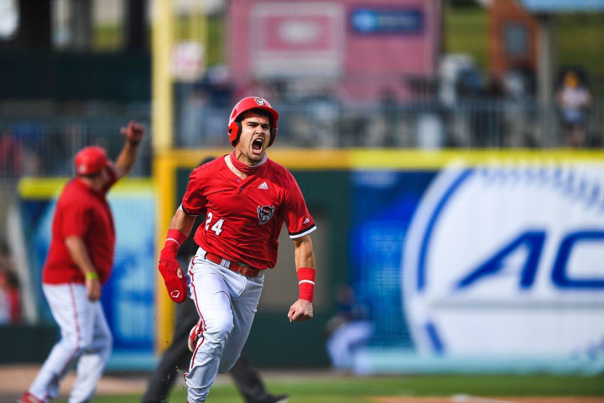Sophomore catcher Luca Tresh celebrates during NC State baseball's semifinal showdown with Georgia Tech. The Wolfpack won the game 8-1, advancing to the championship game.