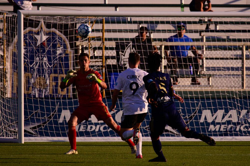 NCFC goalkeeper Damian Las catches the ball against Fort Lauderdale CF on Saturday, June 5, 2021 at WakeMed Soccer Park. NCFC lost 2-1.