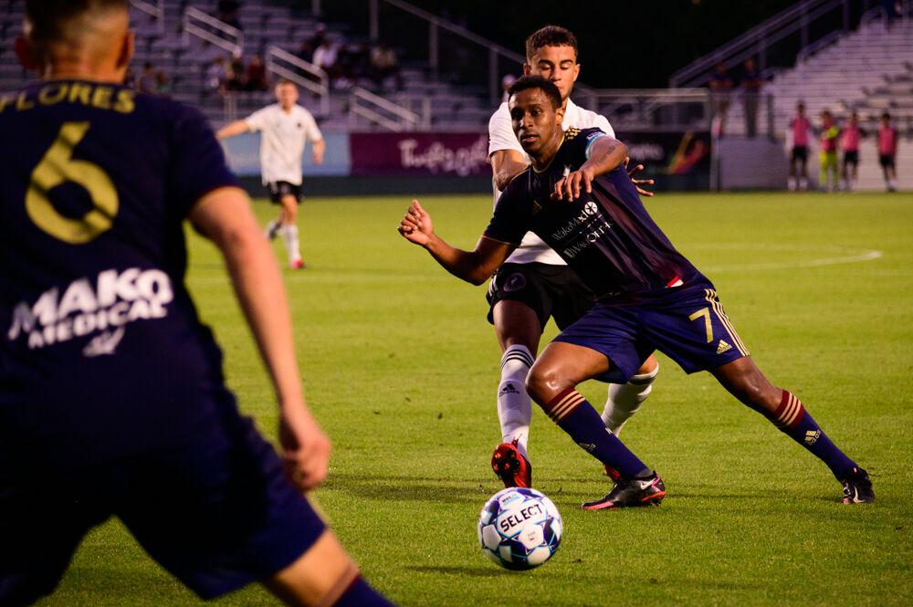 NCFC midfielder Pecka passes against Fort Lauderdale CF on Saturday, June 5, 2021 at WakeMed Soccer Park. NCFC lost 2-1.