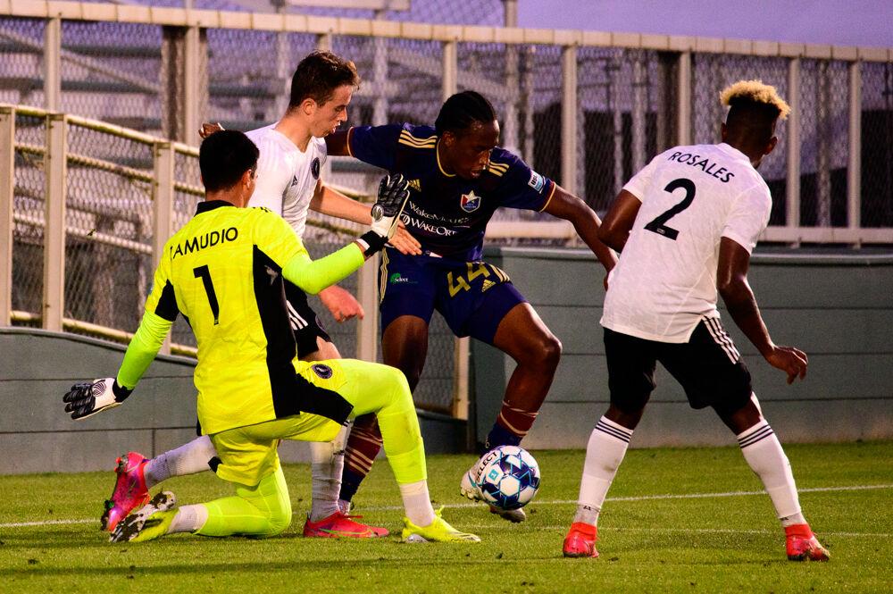 NCFC forward Thorn Simpson attacks the Fort Lauderdale CF defense on Saturday, June 5, 2021 at WakeMed Soccer Park. NCFC lost 2-1.