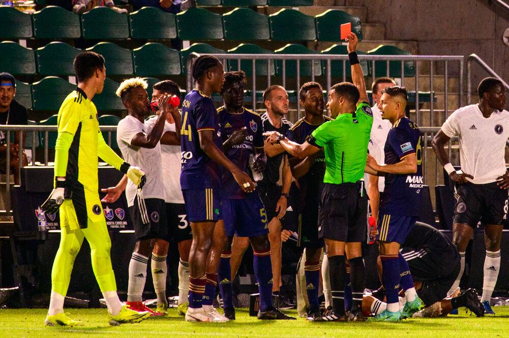NCFC defender Malick Mbaye is shown a red card against Fort Lauderdale CF on Saturday, June 5, 2021 at WakeMed Soccer Park. NCFC lost 2-1.