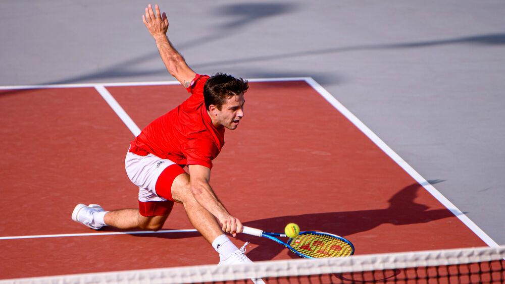 Fifth-year Alexis Galarneau lunges to return the ball against Florida State on Friday, March 12, 2021 at J.W. Isenhour Tennis Center. Galarneau won his singles match 6-2, 6-3, helping the Wolfpack to a 4-0 victory over the Seminoles.