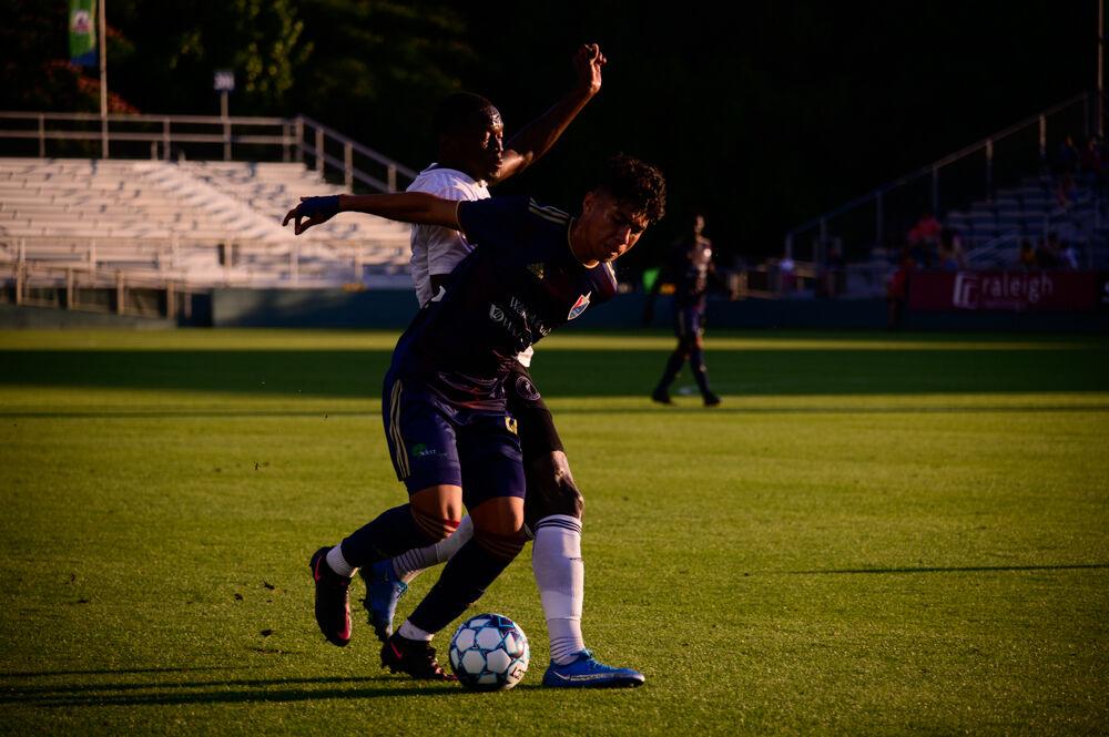 NCFC defender Nelson Martinez dribbles against Fort Lauderdale CF on Saturday, June 5, 2021 at WakeMed Soccer Park. NCFC lost 2-1.