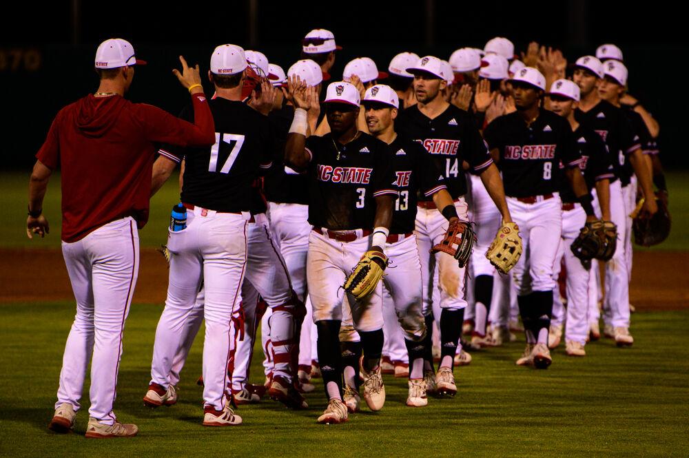 NC State Baseball celebrates the win against No. 16 Florida State on Friday, May 21, 2021 at Doak Field. The Wolfpack won 6-4.