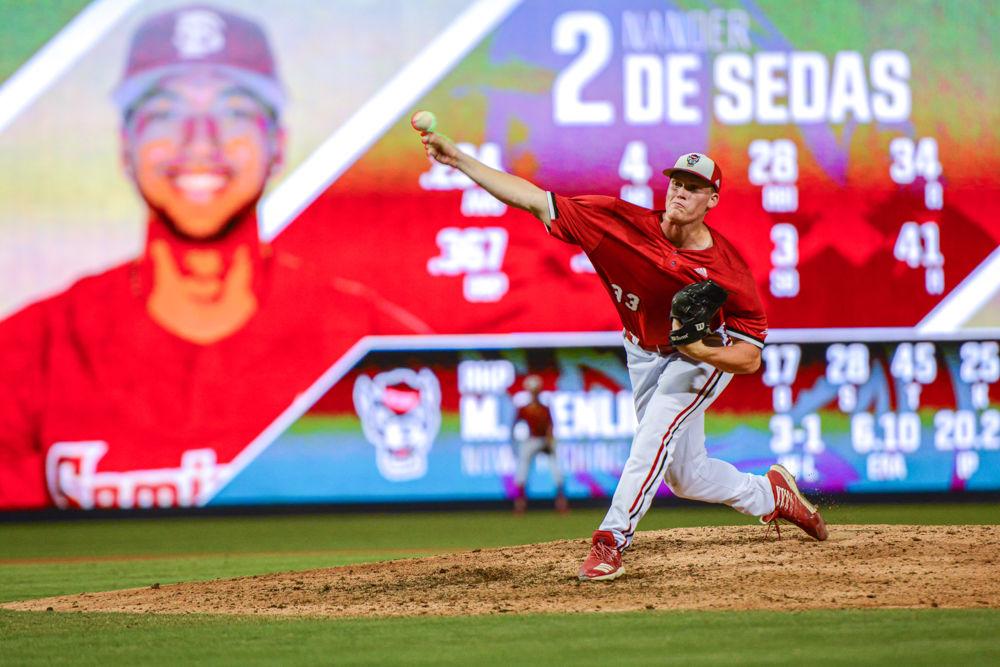 Junior pitcher Michael Bienlien delivers the ball against Florida State infielder Nander De Sedas during the ACC Tournament on Friday, May 24, 2019 at Durham Bulls Athletic Park. Bienlien pitched three innings, striking out five while giving up five earned runs on six hits. The Wolfpack lost 11-0.