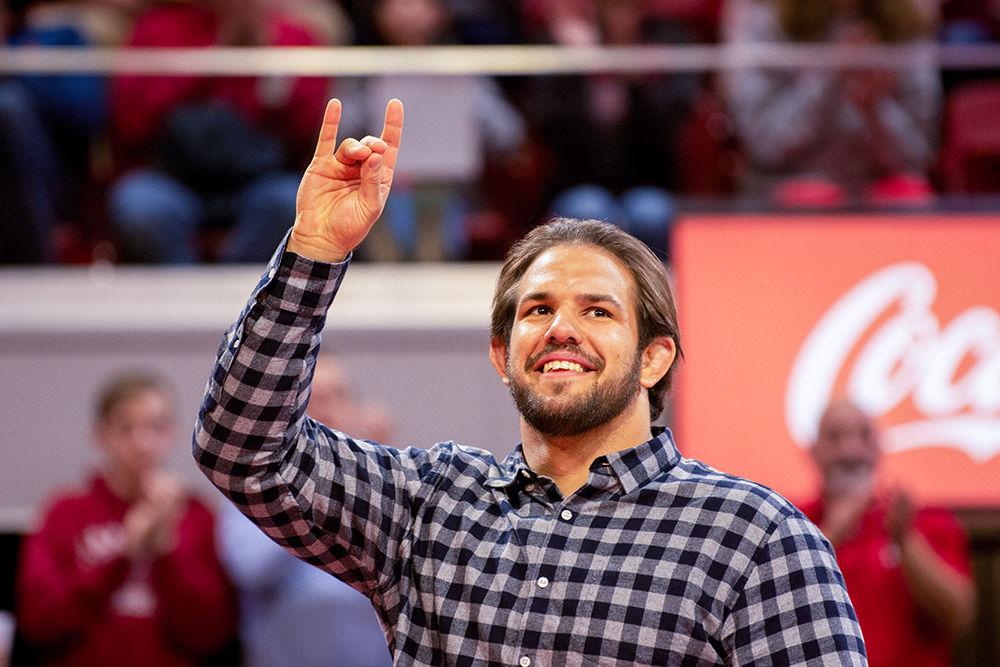 Former Wolfpack wrestling member, Nick Gwiazdowski, thanks the cheering crowd after his attendence is announced at NC State&#8217;s wrestling match versus Virgina Tech on Friday, Feb. 14 at Reynolds Coliseum. Gwiazdowski is a freestyle wrestler for Team USA and won a bronze medal in the 125 kg division at the 2017 World Championships.