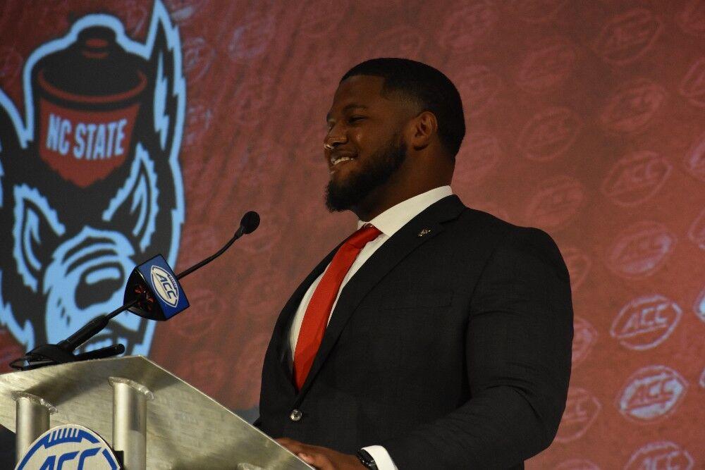 Redshirt junior center Grant Gibson stands at the podium to answer questions during the 2021 ACC Football Kickoff at the Westin Hotel in Charlotte, North Carolina on July 22, 2021.