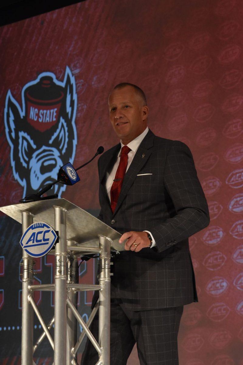 NC State head football coach Dave Doeren stands at the podium to answer questions during the 2021 ACC Football Kickoff at the Westin Hotel in Charlotte, North Carolina on July 22, 2021.