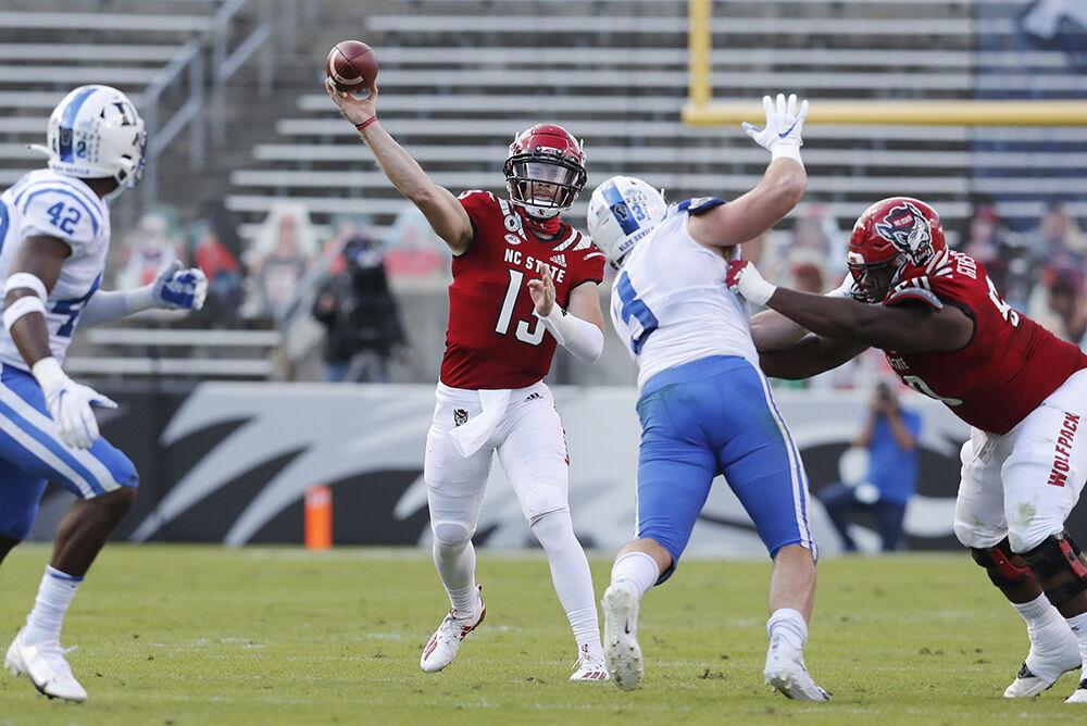 N.C. State quarterback Devin Leary (13) passes during the first half of N.C. State&#8217;s game against Duke at Carter-Finley Stadium in Raleigh, N.C., Saturday, Oct. 17, 2020.