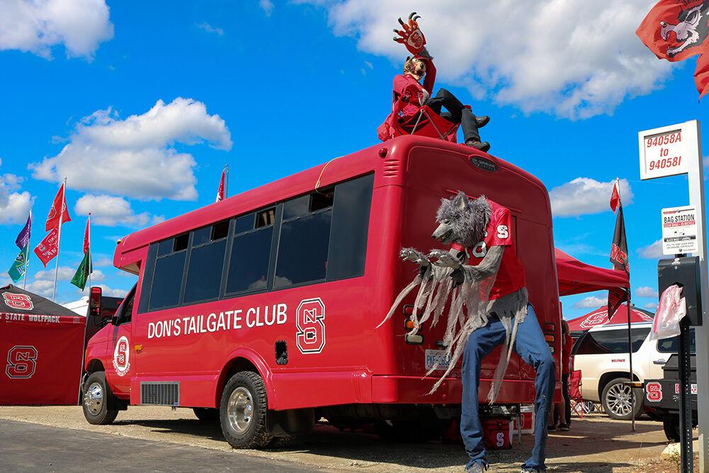 NC State fans Don and Linda Annas&#8217; tailgating bus sits at the NC State Fairgrounds prior to the football game against Virginia on Saturday, Sept. 29, 2018. The Wolfpack won 35-21.