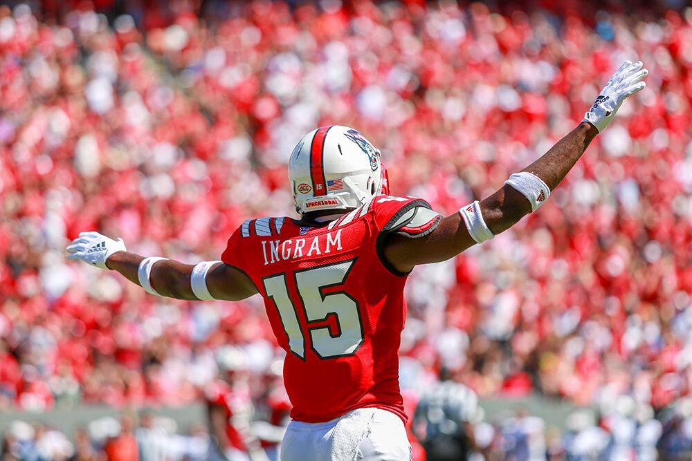 Sophomore cornerback Chris Ingram signals an incomplete catch. Ingram had three tackles and a pass breakup on the day. The Wolfpack took down Virginia 35-21 on Saturday, Sept. 29, 2018, in Carter-Finley Stadium.
