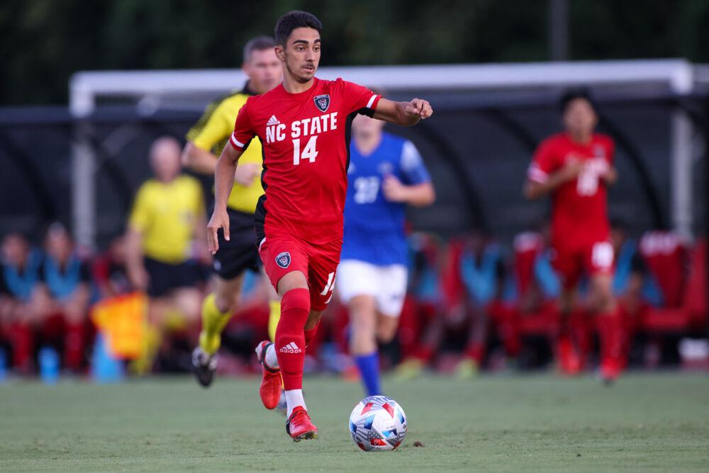 Freshman forward Henrique Santos carries the ball upfield. Santos had a goal and an assist in the 4-0 win over UNC Asheville on Monday, Aug. 30, 2021.