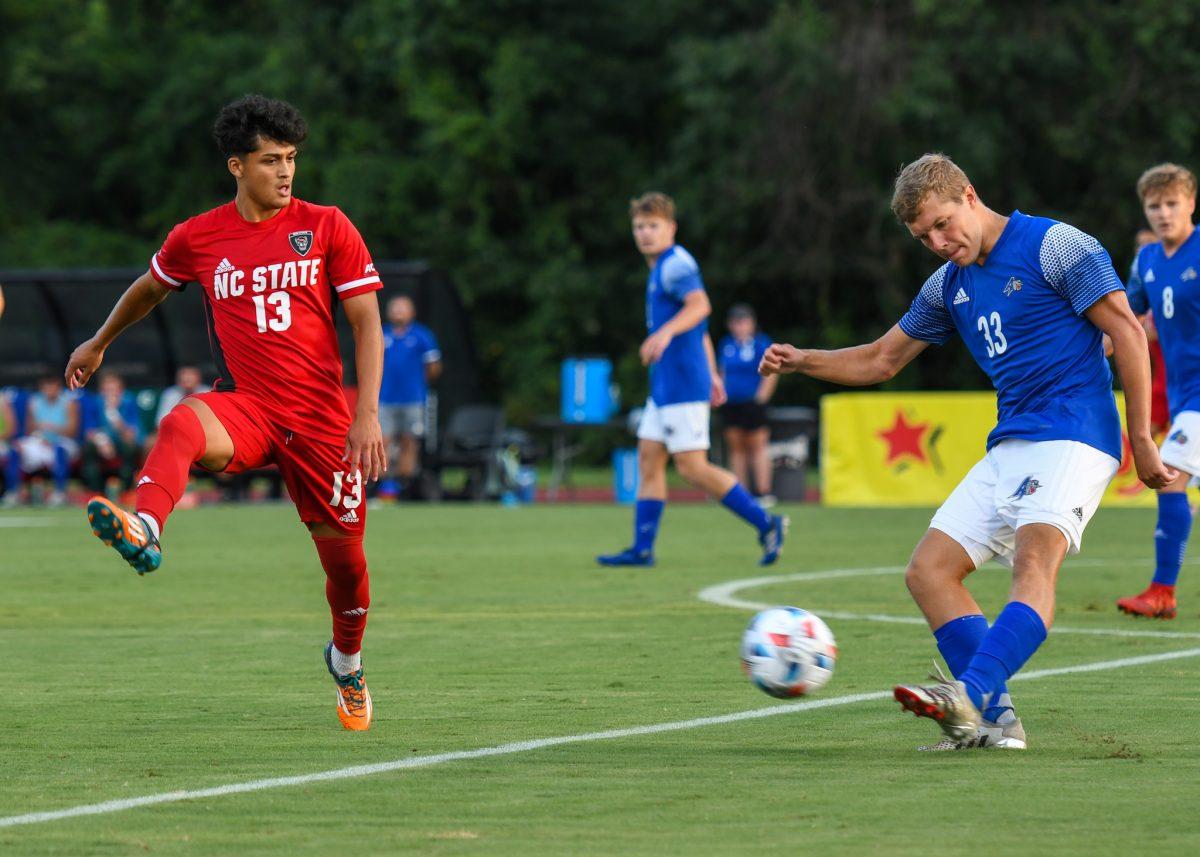 Senior midfielder Alex Hernandez looks to block a clearing kick by the UNC-Asheville defense on Monday, Aug. 30, 2021 at Dail Soccer Field. Hernandez had one assist against the Bulldogs. NC State beat UNC-Asheville 4-0.