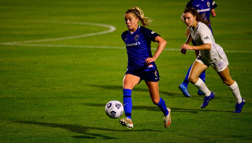 NC Courage midfielder Denise O&#8217;Sullivan dribbles against Racing Louisville on Friday, May 28, 2021 at WakeMed Soccer Park. The Courage won 5-0.