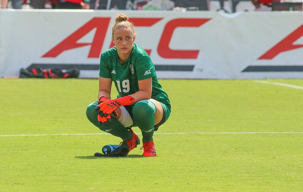 NC State freshman goalkeeper Maria Echezarreta reacts after giving up a goal in the final minute of the match following the NC State Wolfpack's soccer match against the South Carolina Gamecocks at the Dail Soccer Field on Saturday, August 29, 2021. The Wolfpack lost the match 2-1 on a last-minute score by the Gamecocks.
