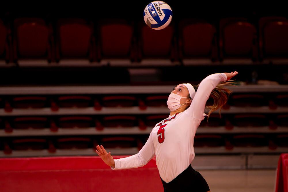 Sophomore setter Kristen McDaniel serves against Clemson on Friday, March 19, 2021 at Reynolds Coliseum. McDaniel recorded 45 assists and 13 digs as the Wolfpack won in straight sets.