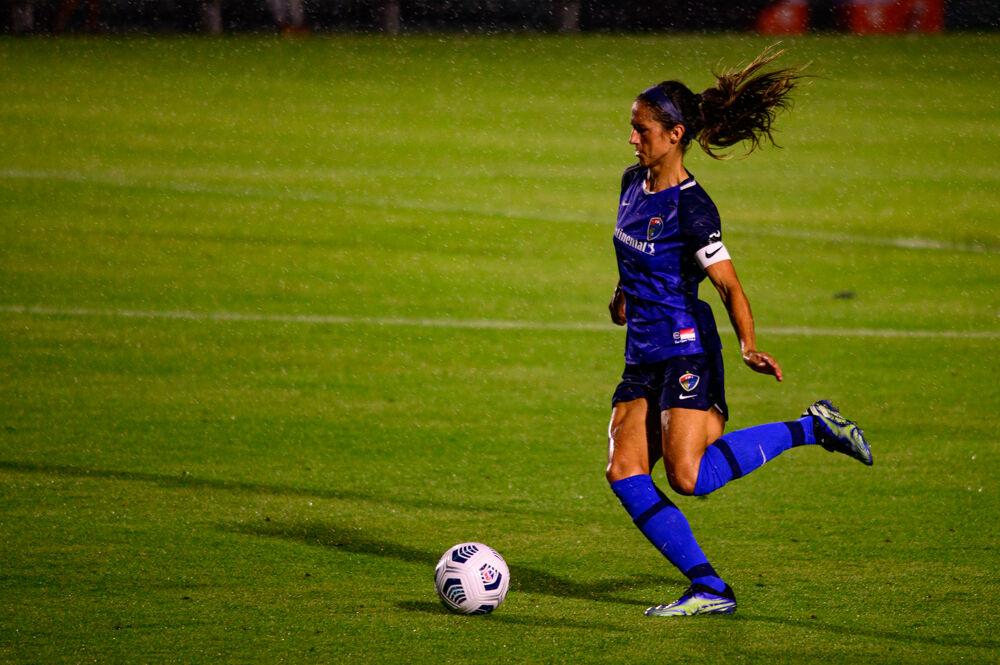 NC Courage defender Abby Erceg dribbles against Racing Louisville on Friday, May 28, 2021 at WakeMed Soccer Park. Erceg scored one goal as the Courage won 5-0.