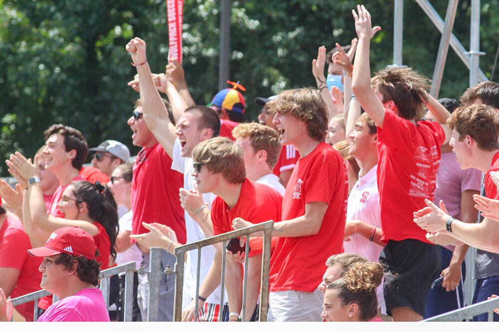 The NC State student section celebrates after an early goal during the NC State Wolfpack's soccer match against the South Carolina Gamecocks at the Dail Soccer Field on Saturday, August 29, 2021. The Wolfpack lost the match 2-1 on a last-minute score by the Gamecocks.