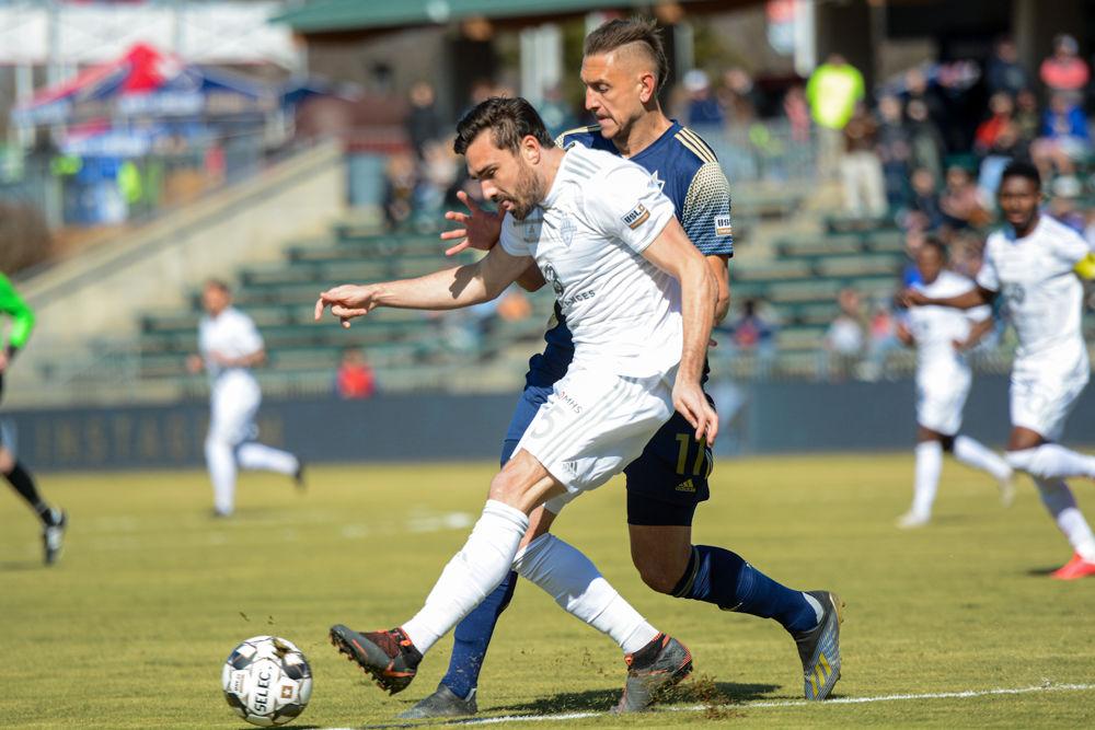 Forward Robbie Kristo fights for possession of the ball at the game against Louisville City FC on Saturday, March 7, 2020 at Sahlen&#8217;s Stadium at WakeMed&#160;Soccer Park. The NCFC lost the game to Louisville 0-1.