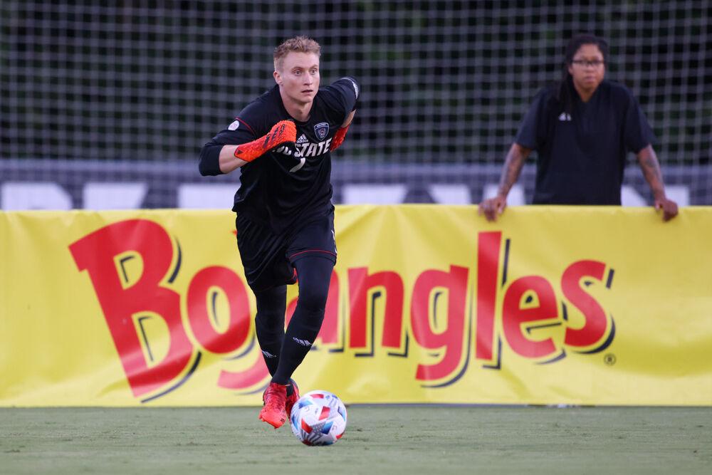 Redshirt senior keeper Leon Krapf dribbles the ball upfield during the 4-0 win over UNC Asheville on Monday, Aug. 30, 2021.