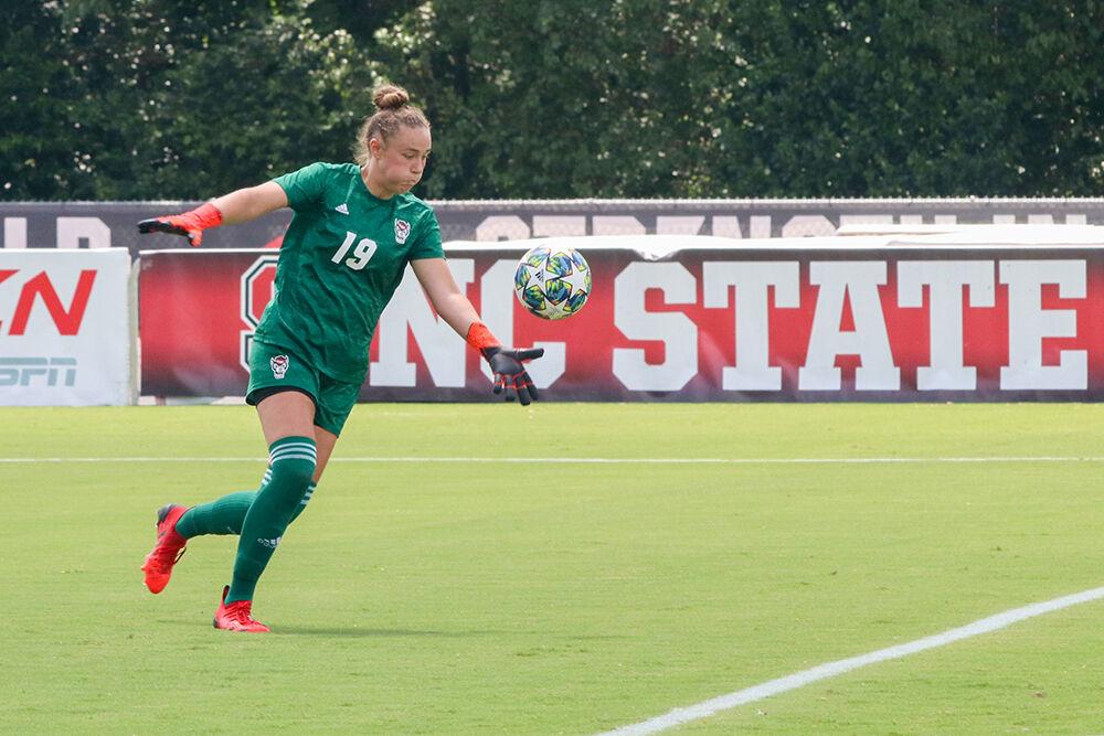 NC State freshman goalkeeper Maria Echezarreta punts the ball during the NC State Wolfpack's soccer match against the South Carolina Gamecocks at the Dail Soccer Field on Saturday, August 29, 2021. The Wolfpack lost the match 2-1 on a last-minute score by the Gamecocks.