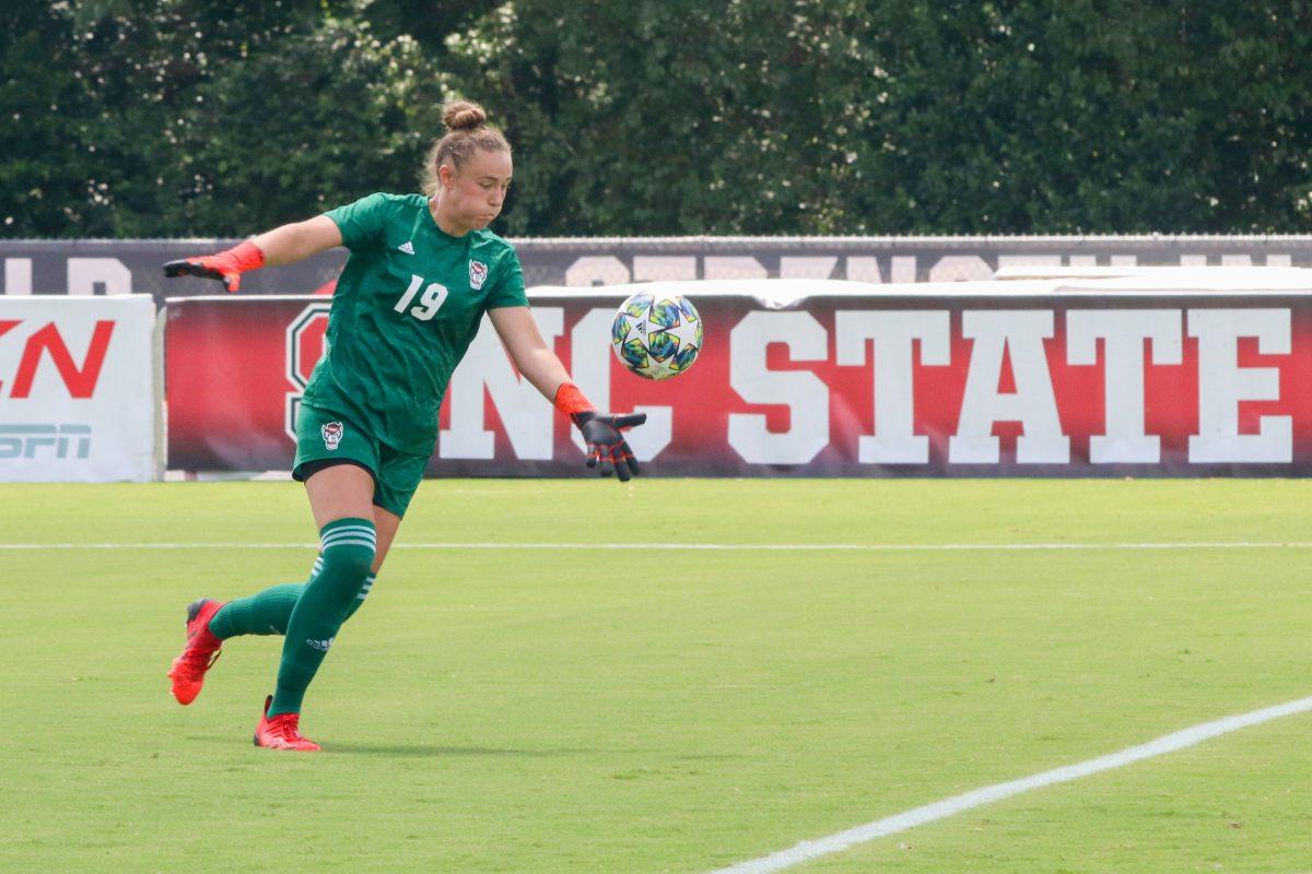 NC State freshman goalkeeper Maria Echezarreta punts the ball during the NC State Wolfpack's soccer match against the South Carolina Gamecocks at the Dail Soccer Field on Saturday, August 29, 2021. The Wolfpack lost the match 2-1 on a last-minute score by the Gamecocks.