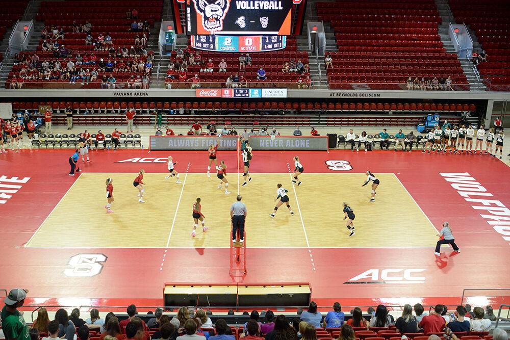 The NC State Wolfpack compete against the Coastal Carolina Chanticleers in the first exhibition match of the season in Reynolds Coliseum on Saturday, August 21, 2021. The Chanticleers won the match 3-1, though the teams agreed to play a fifth set.