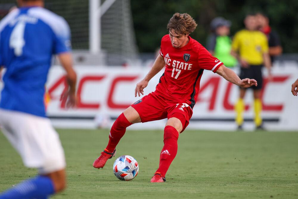 Freshman midfielder Luke Hille makes a cut to change direction during the 4-0 win over UNC Asheville on Monday, Aug. 30, 2021.