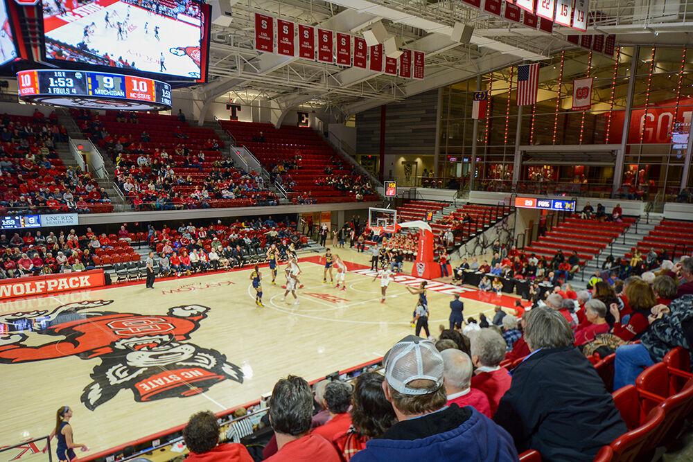 Fans watch the women's basketball game against the University of Michigan on Thursday, Nov. 29, 2018 in Reynolds Coliseum. The arena inside Reynolds Coliseum will officially be named the "James T. Valvano Arena" after the late coach, also known as "Jimmy V", during the men's basketball game against Western Carolina on Dec. 5.