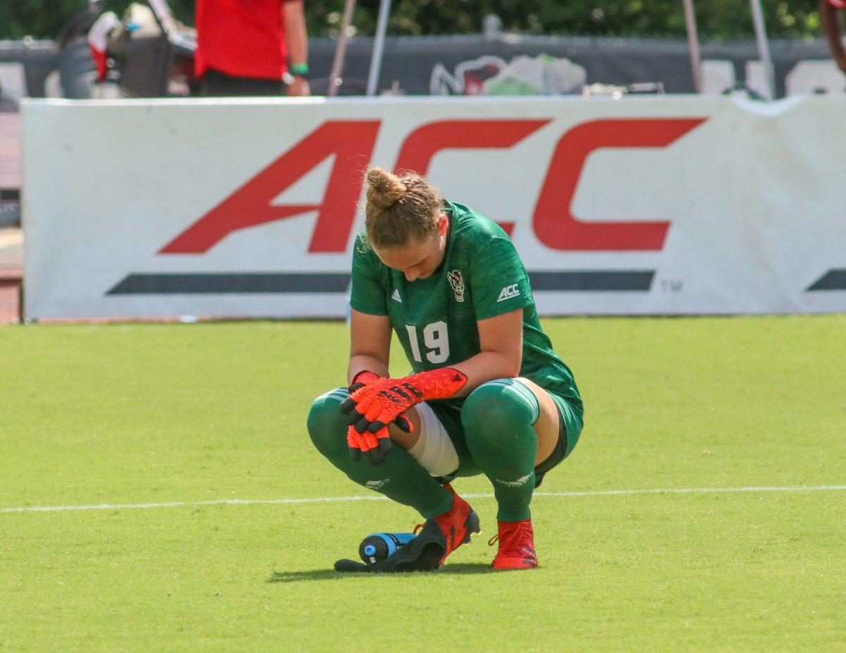 NC State freshman goalkeeper Maria Echezarreta reacts after giving up a goal in the final minute of the match following the NC State Wolfpack's soccer match against the South Carolina Gamecocks at the Dail Soccer Field on Saturday, August 29, 2021. The Wolfpack lost the match 2-1 on a last-minute score by the Gamecocks.
