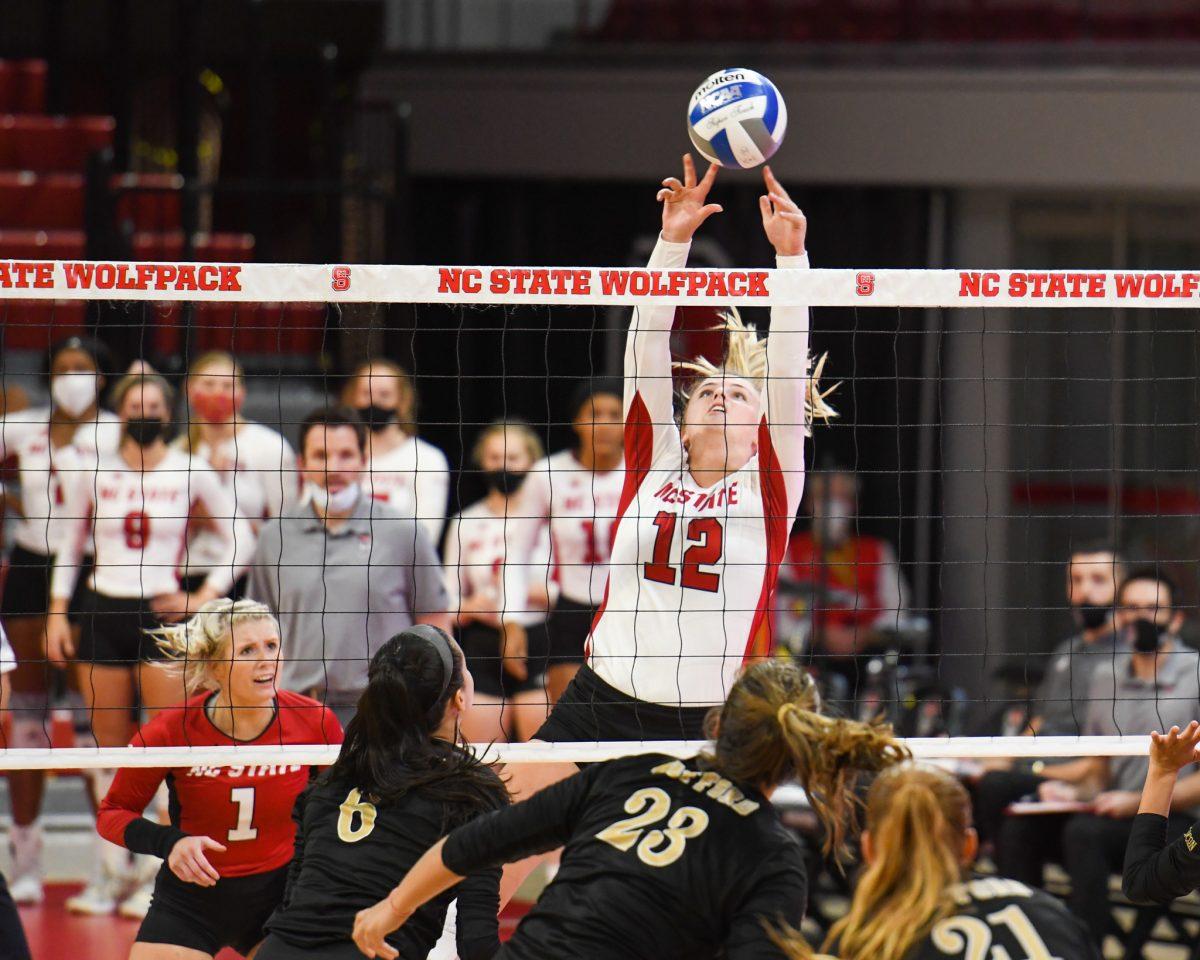 Redshirt junior outside hitter Taylor Rowland looks to score during the game versus the Wofford Terriers on Friday, Sep. 3, 2021 in Reynolds Coliseum. Rowland had 13 kills against Wofford. The Wolfpack beat the Terriers 3-0.