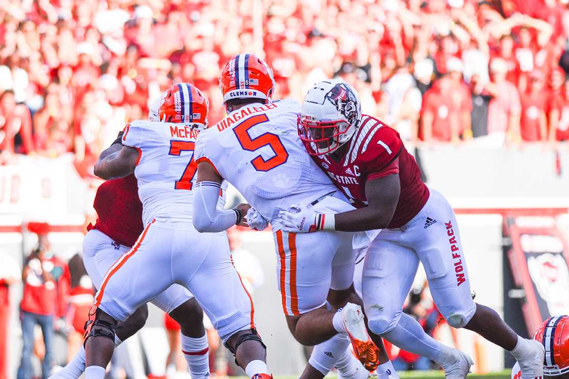 Redshirt junior linebacker Isaiah Moore goes to sack Clemson's quarterback on Saturday, Sept. 25, 2021 in Carter-Finley Stadium. Moore had eight total tackles. The Wolfpack beat the Tigers in double overtime 27-21.