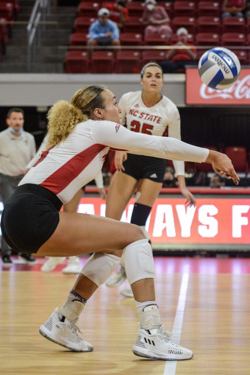 Graduate Melissa Evans defends a kill from the Georgia Bulldogs during NC State's game on Thursday, Sept. 16, 2021 in Reynolds Coliseum. Evans had 14 digs during the 3-1 win.