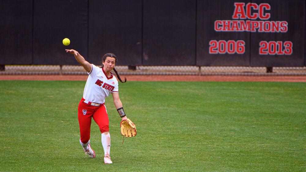 Redshirt senior outfielder Tatyana Forbes throws the ball in against Virginia Tech on Sunday, March 14, 2021 at Dail Softball Stadium. The Wolfpack lost 17-4.