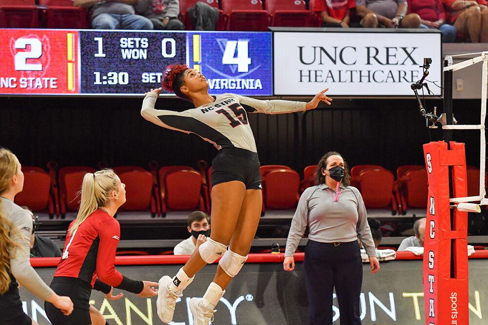 Senior outside hitter Jade Parchment jump serves against Virginia&#160;during the game Friday, Sept. 24, 2021.&#160;The Wolfpack beat Virginia 3-1 in its ACC opener.