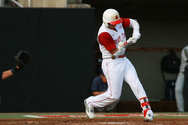 Junior catcher Andrew Knizner fouls off a pitch in the Wolfpack's first game of the NCAA Regional Tournament against Navy at Doak Field in Raleigh on June 3, 2016.