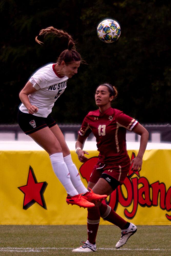 Junior defender Jenna Butler heads the ball against Boston College on Saturday, April 17, 2021 at Dail Soccer Field. The Wolfpack won 3-1.