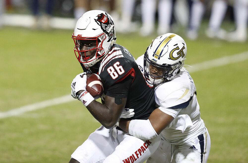 N.C. State wide receiver Emeka Emezie (86) pulls in a reception as Georgia Tech defensive back Wesley Walker (39) defends during the second half of N.C. State&#8217;s 23-13 victory over Georgia Tech at Carter-Finley Stadium in Raleigh, N.C., Saturday, Dec. 5, 2020.