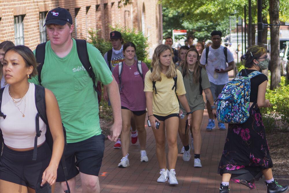 Students pass by 111 Lampe Dr. while on their way to class on the first day of classes Aug. 16, 2021.