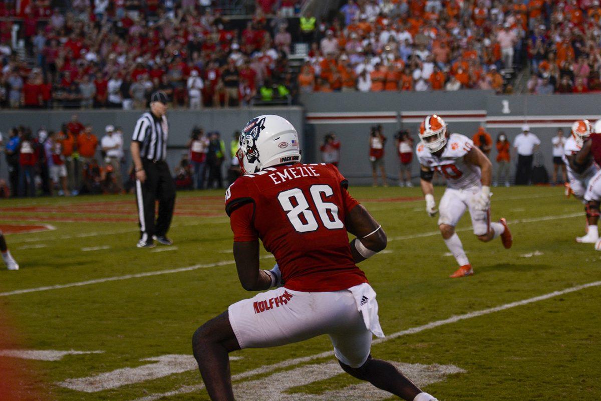 Senior wide receiver Emeka Emezie uses a juke move after a reception.&#160;Emezie amassed 116 receiving yards and 1one&#160; touchdown. The NC State Wolfpack defeated the Clemson Tigers 27-21 in double overtime at Carter-Finley Stadium on Sept. 25, 2021.&#160;