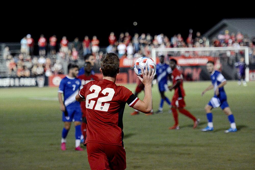 Senior midfielder Aidan Foster throws in on the game against Seton Hall on Sept. 3, 2021 at Dail Soccer Stadium. NC State lost the game to the Pirates 3-1.