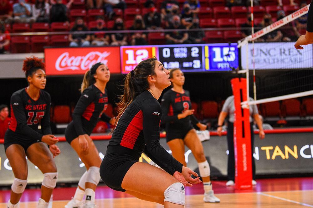 Freshman defensive specialist Saskia Hernandez bumps the volleyball across the net on Sunday, Sept. 26, 2021 at William Neal Reynolds Coliseum. The Pack lost 3-0 against the Panthers.
